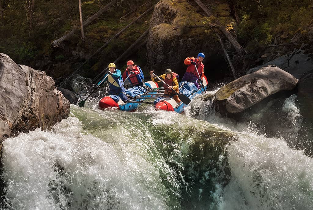 Group going down rapids.